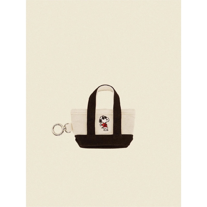 The Little Beast Snoopy Poop Bag Tote in Black or Red